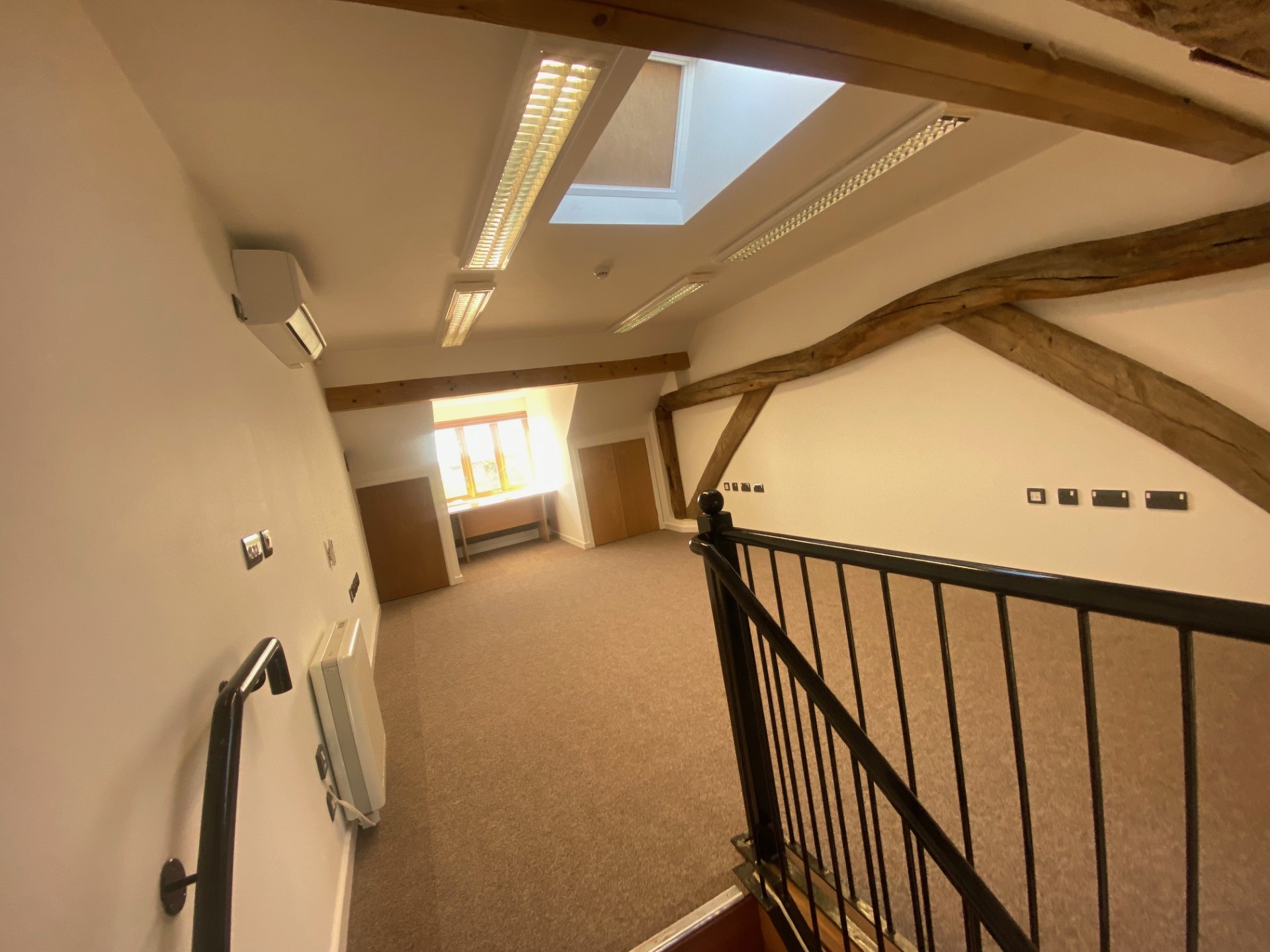 Main upstairs office from the stair position.